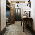 A white ceramic table lamp with a gray and white checkered base from adventuras ziggy border blue porcelain collection