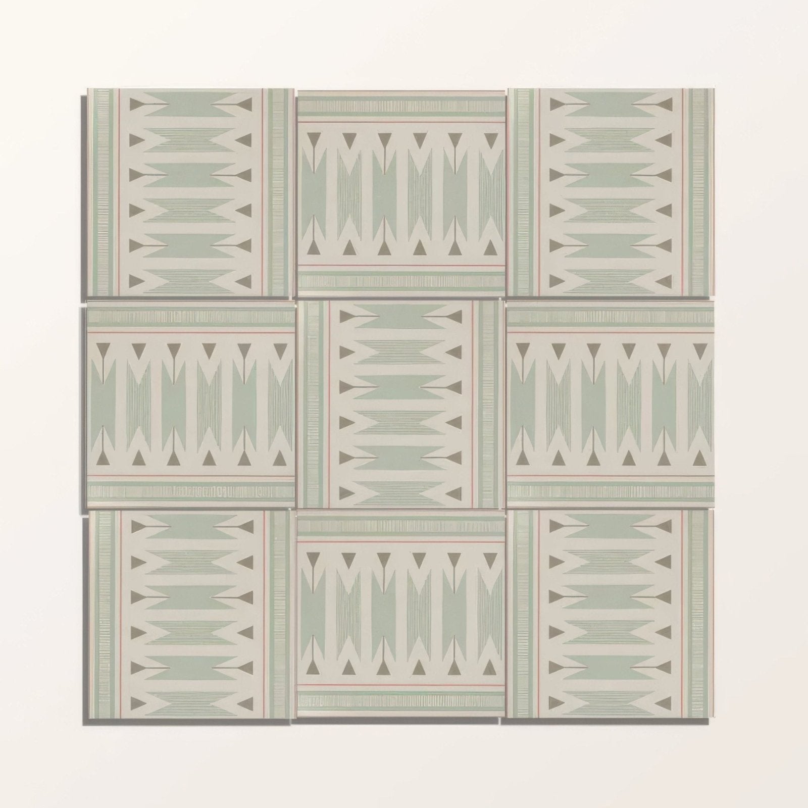 Set of nine Adventuras Ziggy Border Olive porcelain tiles with muted sage green and cream geometric triangular patterns