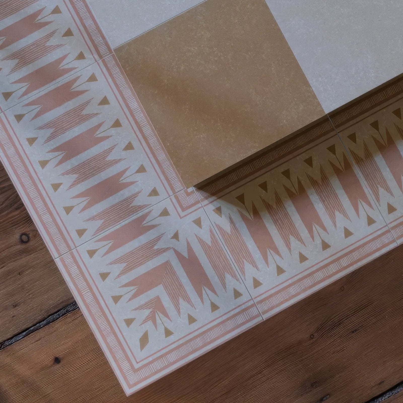 Adventuras ziggy border terracotta porcelain tile with beige and white geometric pattern and triangular border motifs