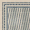 Beige and blue geometric patterned porcelain tile border with repeating diamond design in adventuras ziggy corner blue