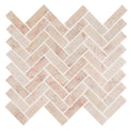 Aegean pink herringbone marble mosaic tile featuring pink marble tiles arranged in a herringbone pattern
