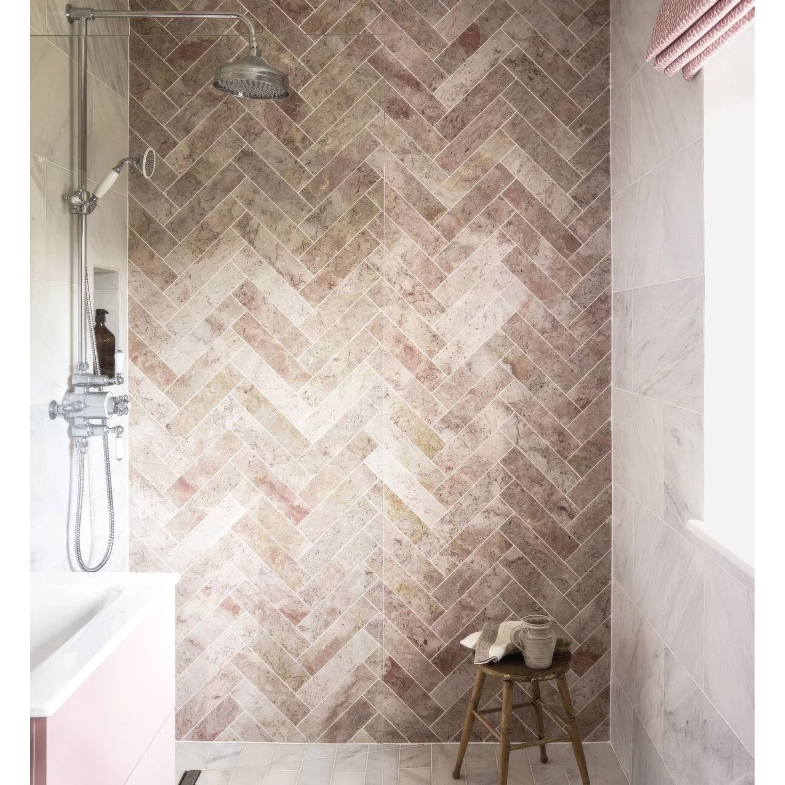 Herringbone-patterned aegean pink marble-effect bathroom tiles in pink and beige 7.5 x 30.5cm size