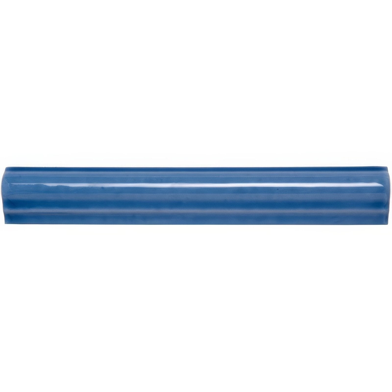 A glossy cobalt blue ceramic agapanthus ogee moulding tile with smooth rounded rectangular shape and subtle ridges