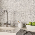 Shiny silver Agra sparkling mosaic tile backsplash with reflective glass material for modern kitchen walls