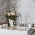 Agra Sparkling Mosaic silver sparkling glass mosaic shown with a chrome dual-handle tap
