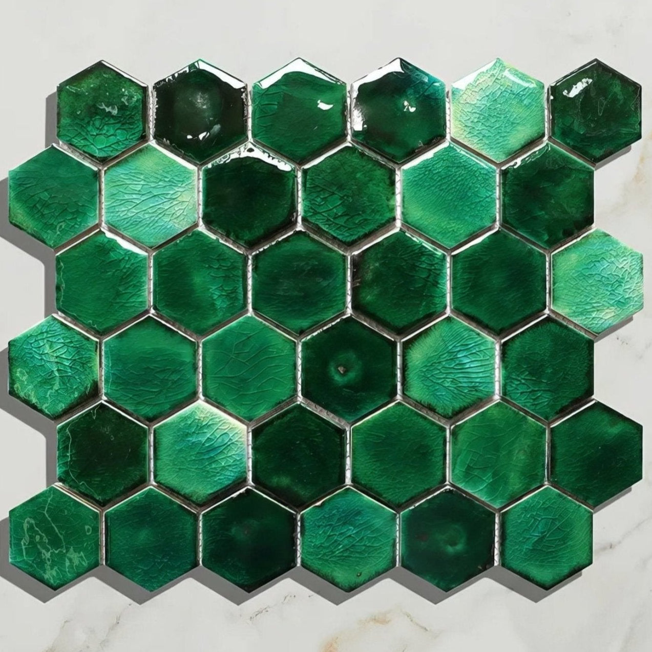 Akazu porcelain emerald mosaic vibrant emerald green hexagonal glass tiles with glossy crackled finish and silver grout
