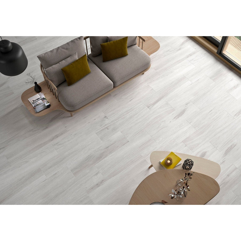 Minoli Albero White Wood Effect Porcelain Tile (22.5x90cm) on a lounge floor