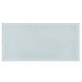 Light blue rectangular glazed tile with subtle textured surface alhambra blue 7.5 x 15 inches