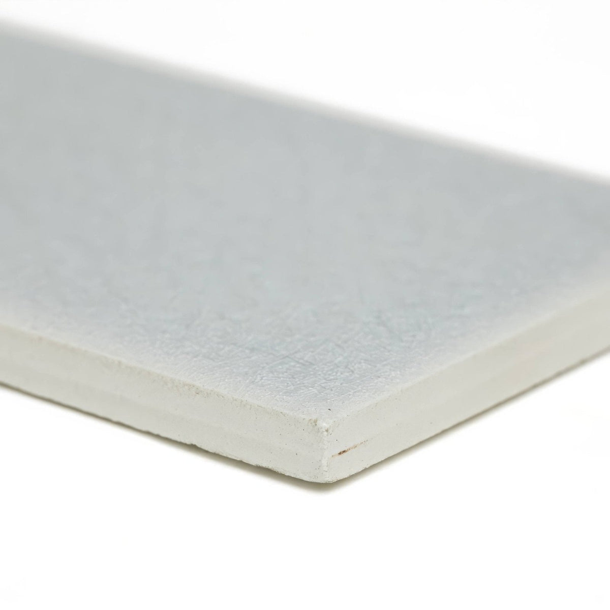 Alhambra Blue 7.5 x 22.5 white rectangular glazed tile with smooth slightly textured surface and rounded edges