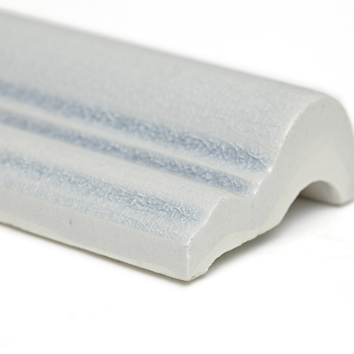 Alhambra blue glazed dado white ceramic tile with subtle blue textured stripes on curved edge 5 x 15cm