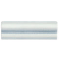 A cylindrical roll of light blue textured fabric with subtle horizontal stitching for Alhambra blue glazed dado tiles