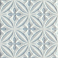 Alhambra blue decor glazed tile featuring white and light blue textured repeating geometric flower patterns