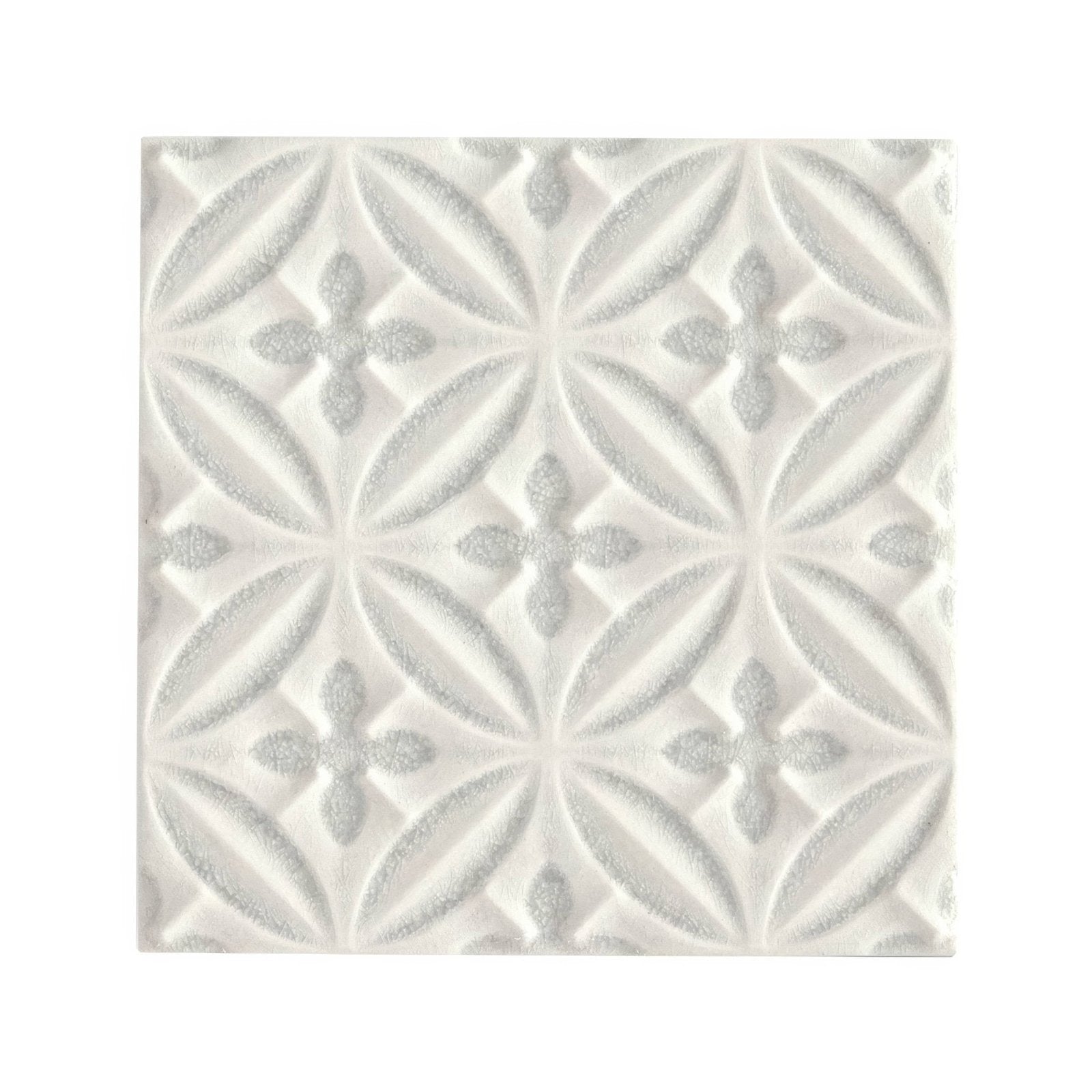 White textured alhambra grey decor glazed tile with repeating geometric interlocking leaf and cross motifs