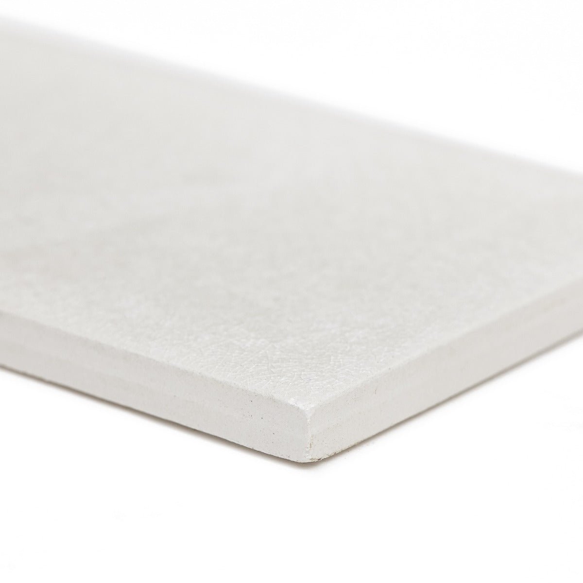 Alhambra white 7.5 x 15 rectangular glazed tile with smooth slightly textured surface and rounded edges