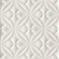 Alhambra white decor glazed tile with white textured panel featuring raised diamond shapes and leaf-like motifs