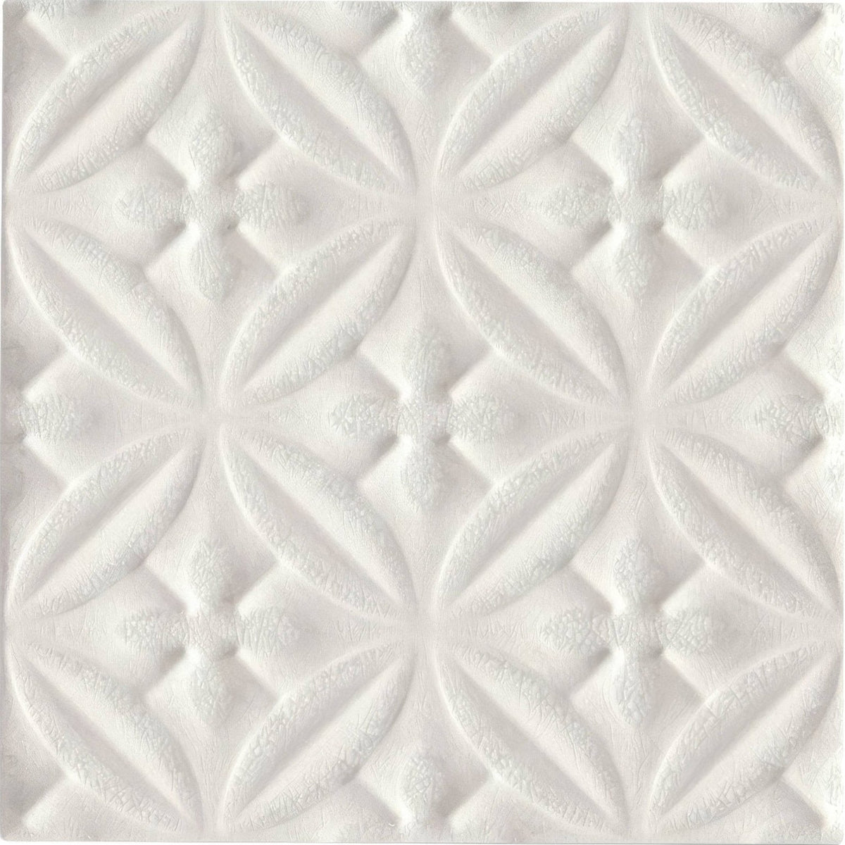 Alhambra white decor glazed tile with white textured panel featuring raised diamond shapes and leaf-like motifs