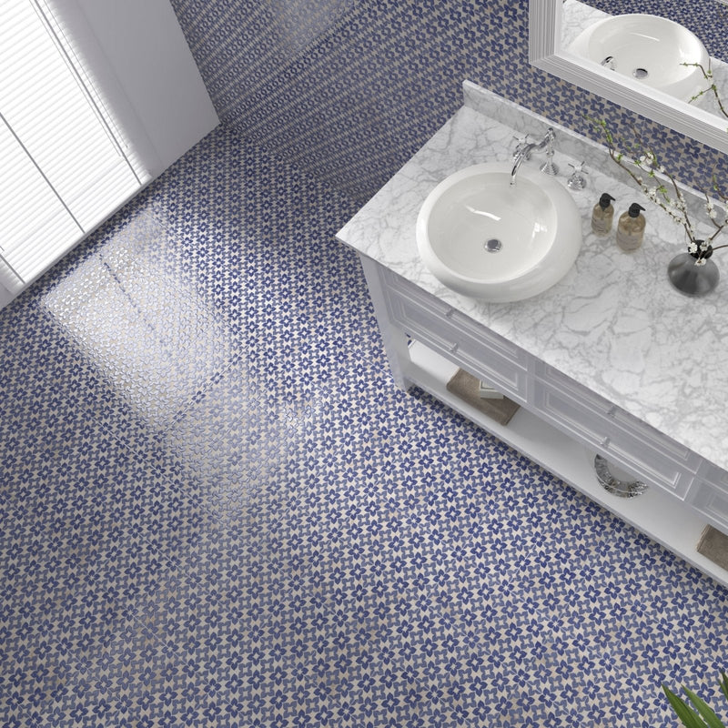 Alma Blue white ceramic vessel sink with polished chrome faucet set into marble countertop for modern bathrooms