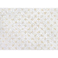 White textured surface with a repeating pattern of small gold cross motifs from alpine golden promise collection