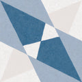Altea blue taco geometric wallpaper with textured finish featuring intersecting blue white and beige triangles
