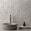Alto White Marble Patterned Mosaic white patterned marble mosaic shown behind a grey vessel sink
