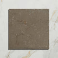 Amaya limestone tumbled cabochon square gray stone tile with matte finish subtle veining and rough texture