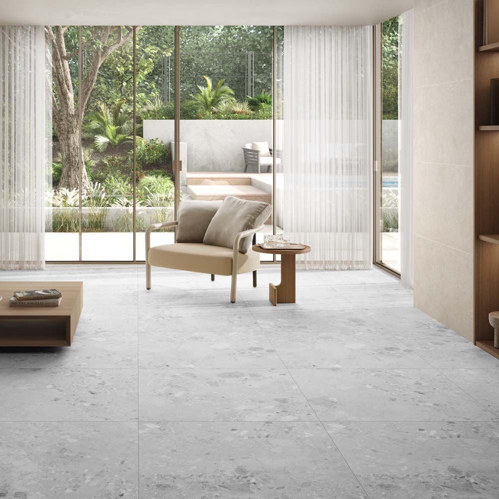 Amaya terrazzo grey matt 90 x 90cm floor tiles with a light gray stone-look and subtle speckled texture