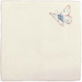 Cream-colored ceramic tile amethyst aurora pastel on cotton featuring a delicately painted white butterfly with blue and red accents