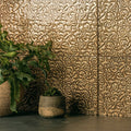 Amun-Ra decorative glass gold-toned embossed wall panels with intricate floral and scrollwork patterns