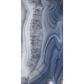 A vertical slice of blue and white agate with swirling layered patterns in ananas blue 60 x 120cm product