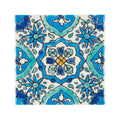 Andalucia Belmez patterned tile ceramic square with intricate blue and turquoise floral hand-painted designs on white background