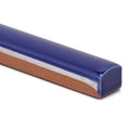 Andalucia blue glazed pencil ceramic tile trim with a glossy finish and earthy brown underglaze detail