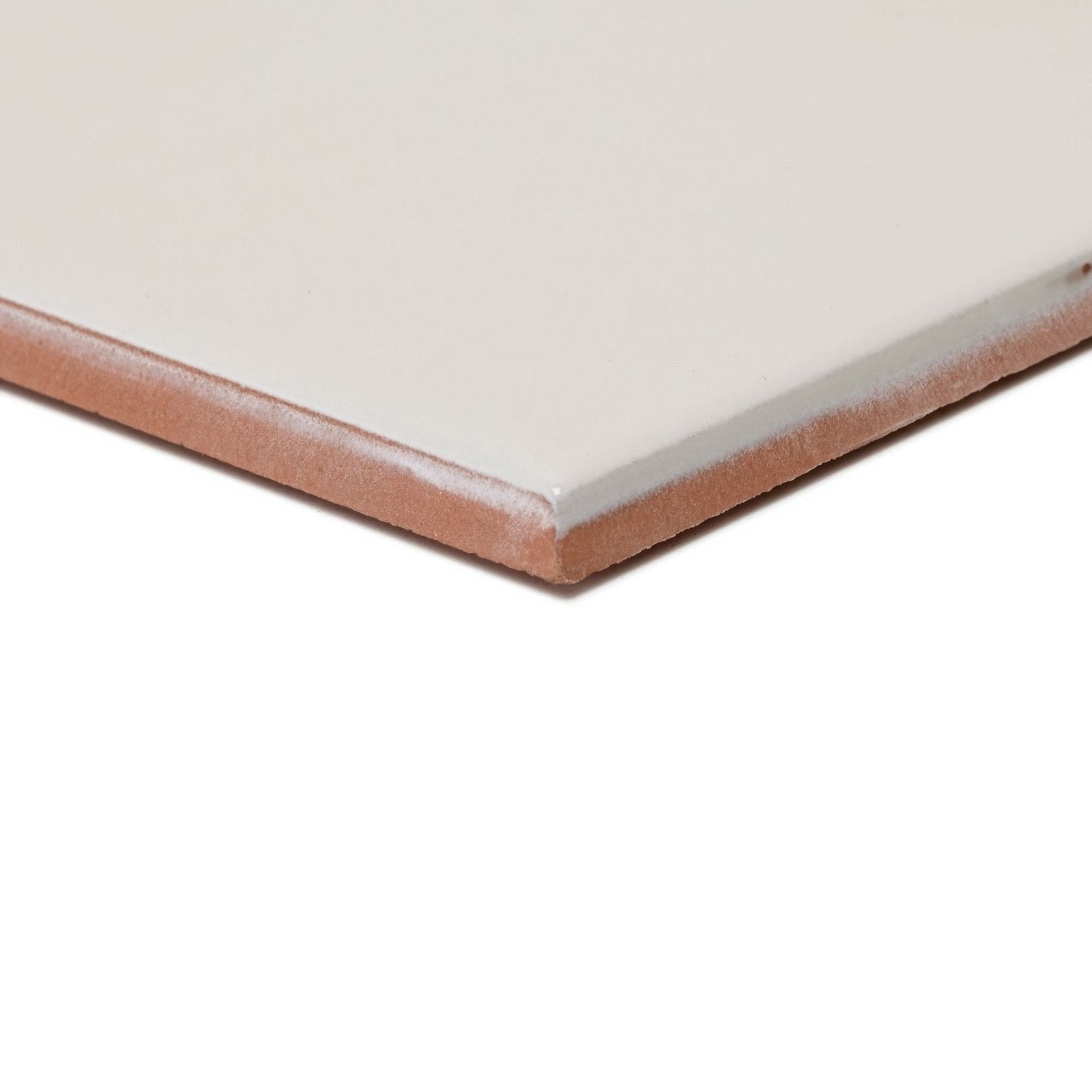Andalucia Cream glazed tile in beige ceramic with a terracotta colored edge for stylish wall or floor use