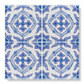 Blue and white ceramic patterned tile with intricate symmetrical floral design from andalucia jerez collection