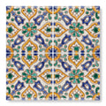 Four-by-four ceramic tile set with vibrant blue green and yellow floral and geometric patterns on cream background