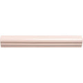 A sleek matte-finished beige ceramic baseboard with a smooth curved profile from anemone ogee moulding collection