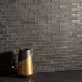 Angami mosaic dark grey and black glass mosaic styled with a two-toned ceramic pitcher