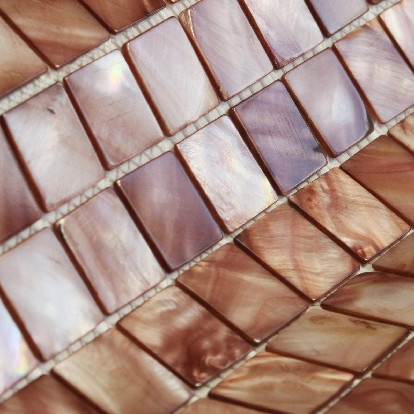 Rectangular iridescent mother-of-pearl mosaic tiles in warm rose and copper tones from antique brass 25mm square collection