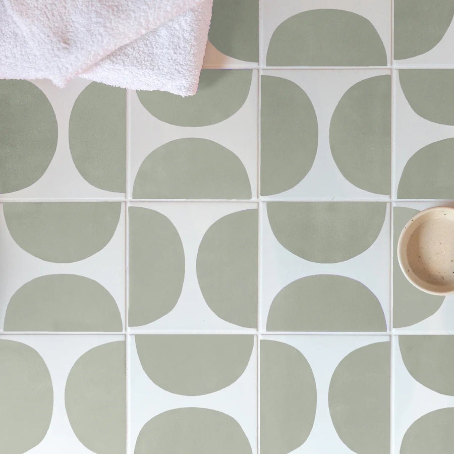 Arc floor willow 15 x 15cm tile featuring a modern repeating pattern of muted sage green semicircles on white