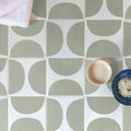 Arc floor willow 15 x 15cm tile floor with muted sage green semi circles on white geometric ceramic tiles
