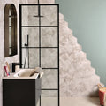 Architectural Elements Porcelain Melange hexagonal bathroom tiles in muted gray and white with embossed floral designs