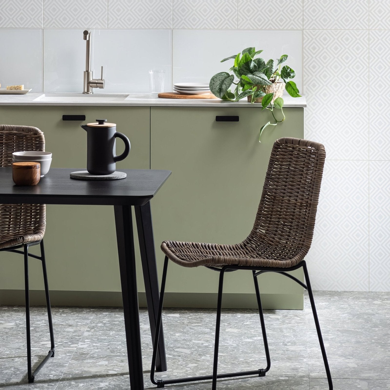 Arctic Clear Glass 600 x 300mm clear glass tiles with a woven rattan chair