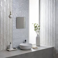 Textured gray ceramic vase with vertical ridges featured in arctic crushed pearl decorative glass collection