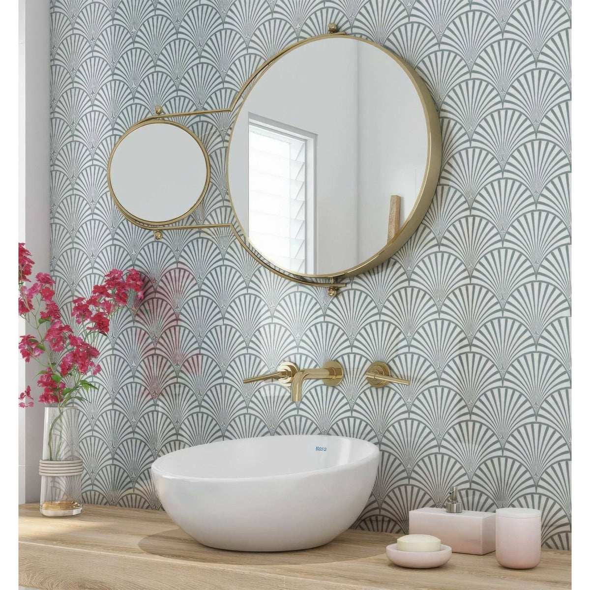 White ceramic vessel sink with gold-toned faucet fixtures paired with art deco decorative fan shower panel