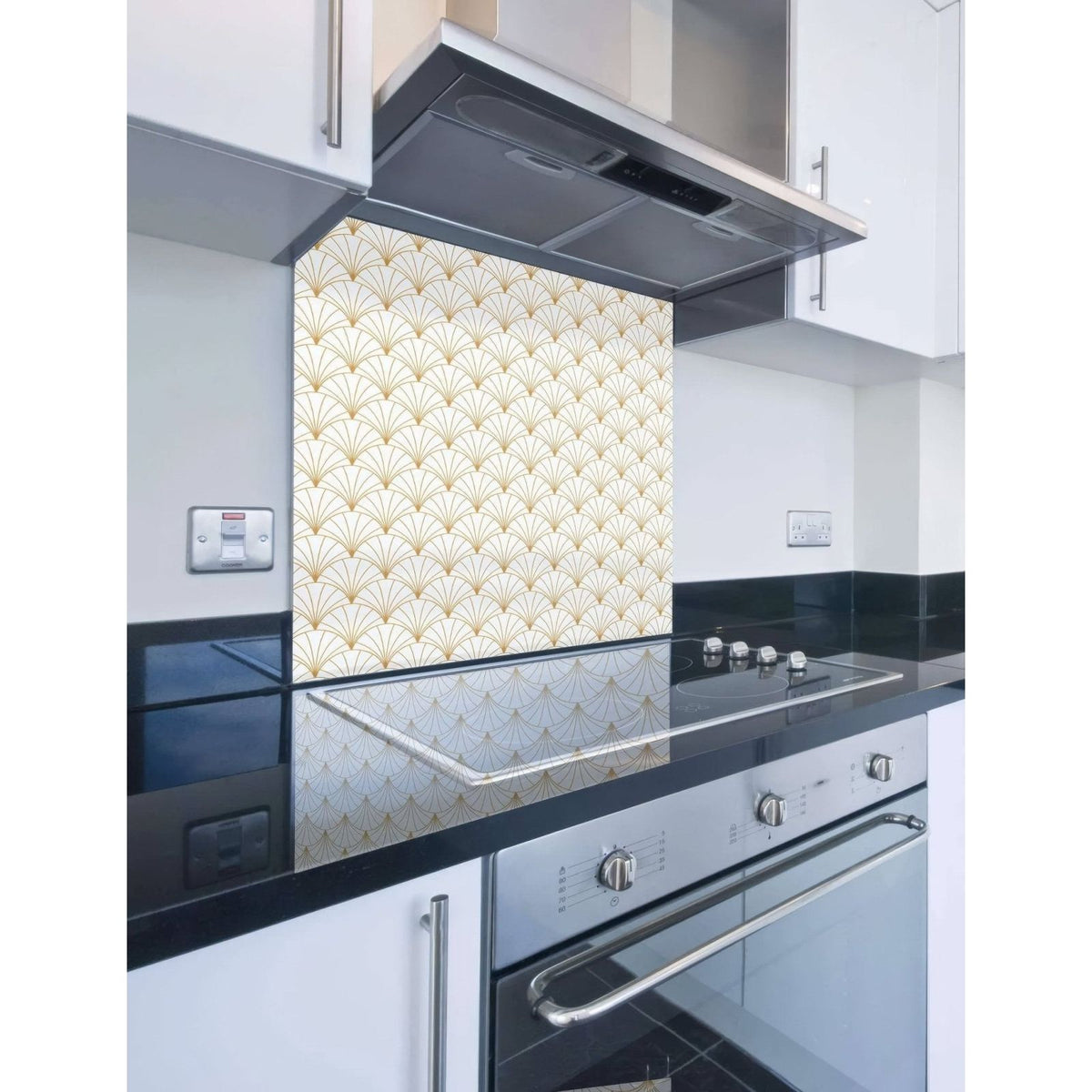 Gold and cream-colored fan-shaped patterned glass kitchen backsplash from art deco sunrise fan shower panel