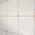 Arte italiano blanco porcelain white square tiles with gray grout lines for elegant wall and floor surfaces