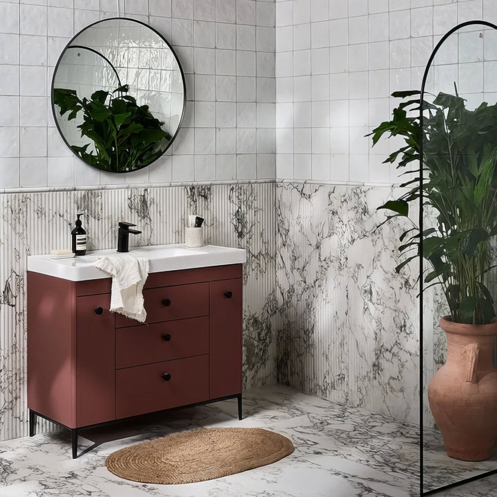 Maroon bathroom vanity with black metal legs and round knobs featuring blanco porcelain top by arte italiano