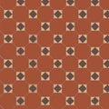 Hexagonal terracotta floor tiles in arundel red brown and white with dark brown diamond pattern in cream squares