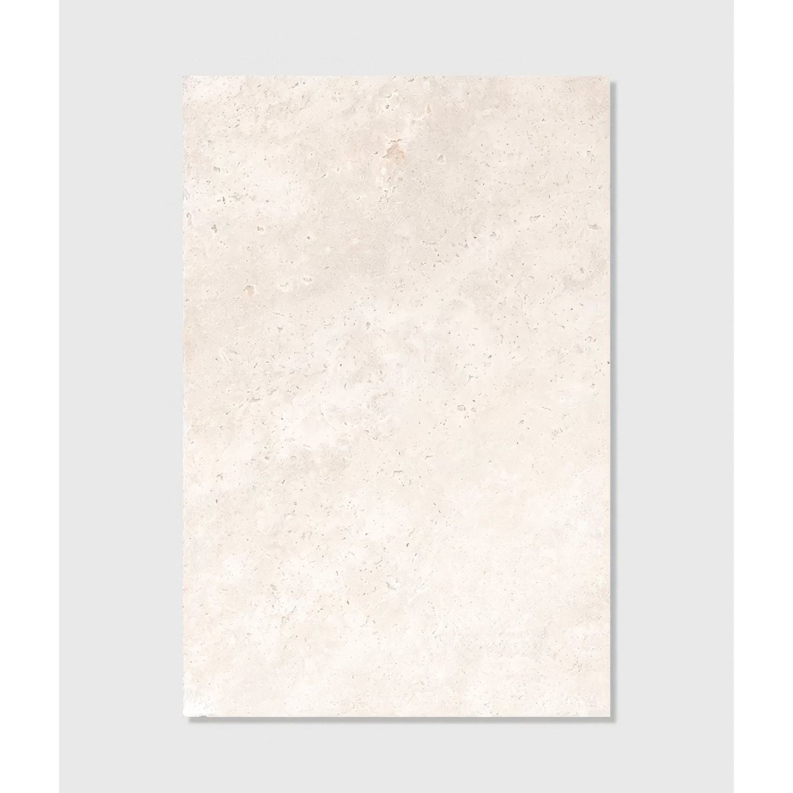 Ascoli porcelain avorio cream-colored rectangular stone tile with subtle texture and faint speckles 60 x 90cm