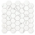 White hexagonal mosaic tile with subtle gray marble-like veining in aspen hexagon mosaic design