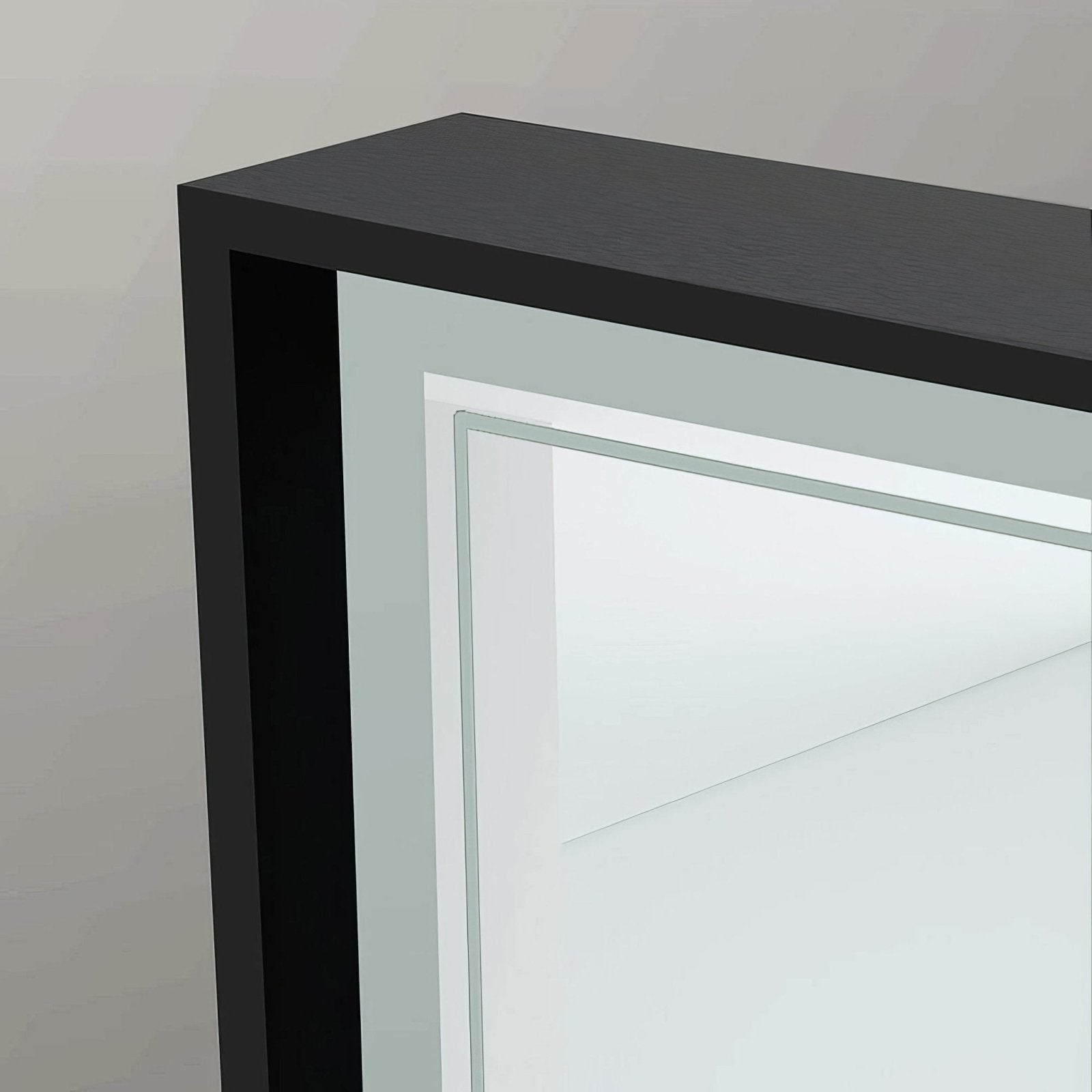 Black-framed Astoria Mirror 75 with sleek modern design and reflective glass surface for stylish home decor